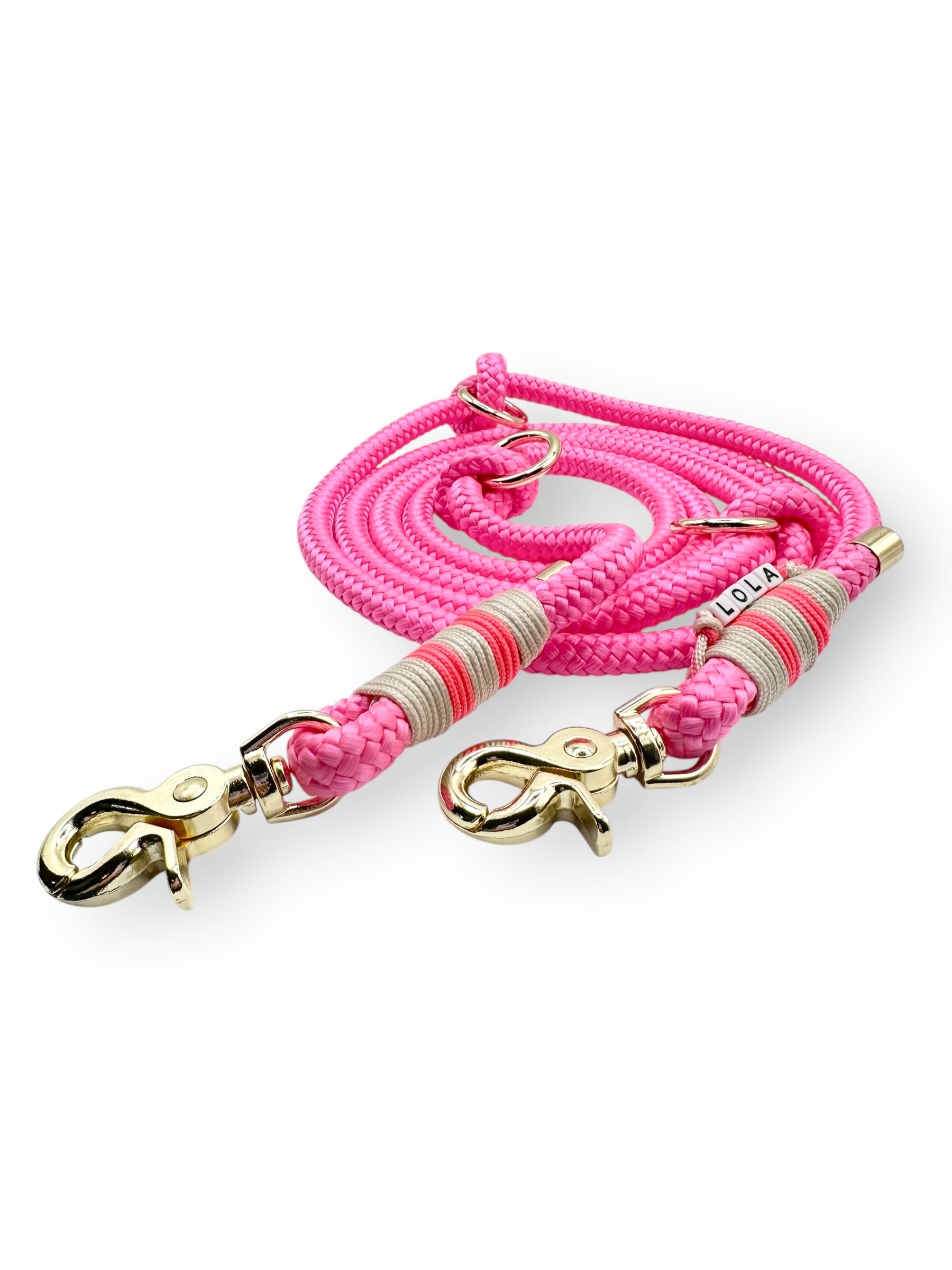 Hundeleine aus Tau in Neon rosa und cream Mit goldenen Details Vorderansicht