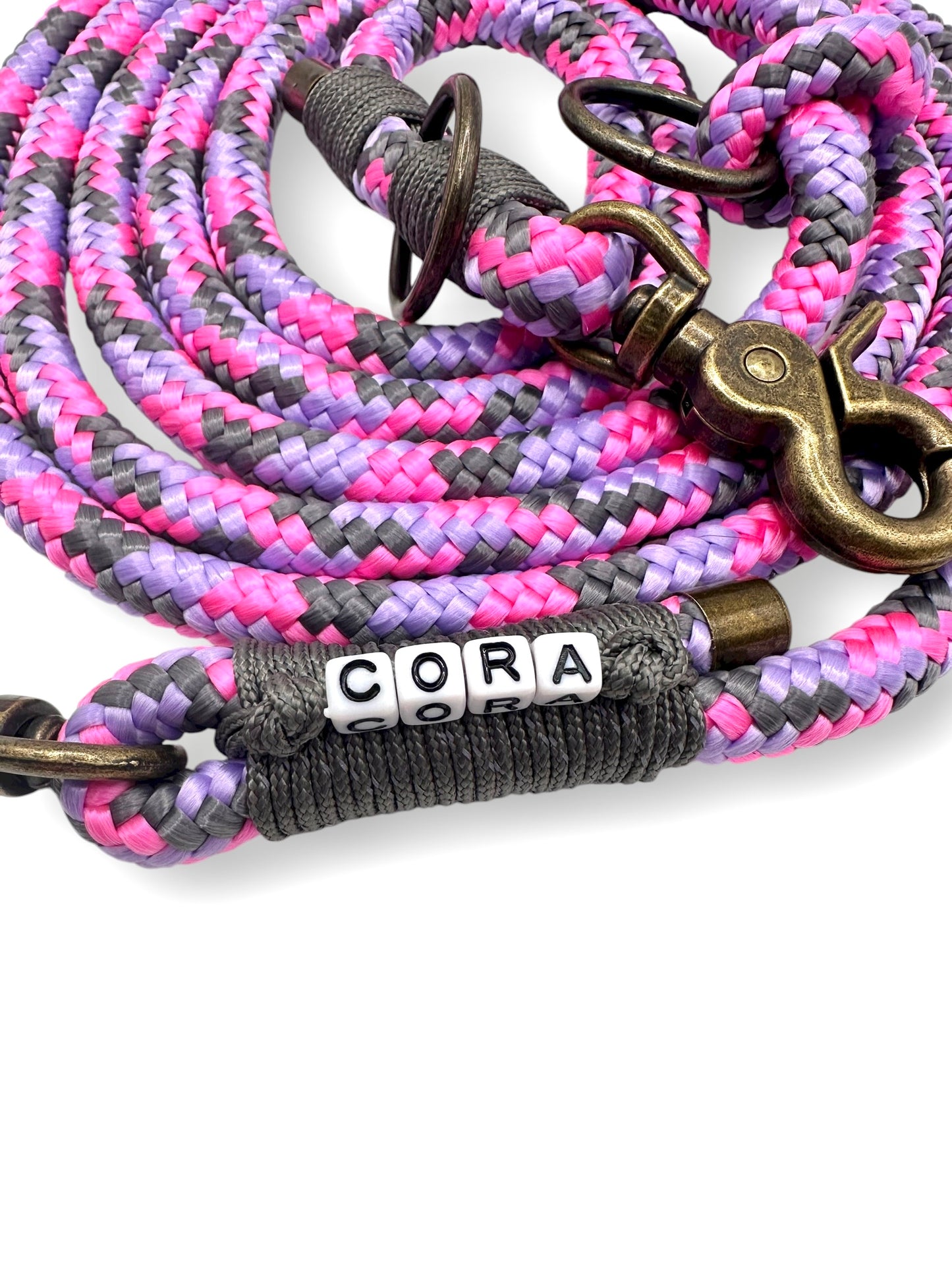 Hundeleine aus 10mm starken Tau mit reflektierender Umwicklung in den Farben rosa, lila und grau. Perfekt für einen Herbstspaziergang. Umwicklung 