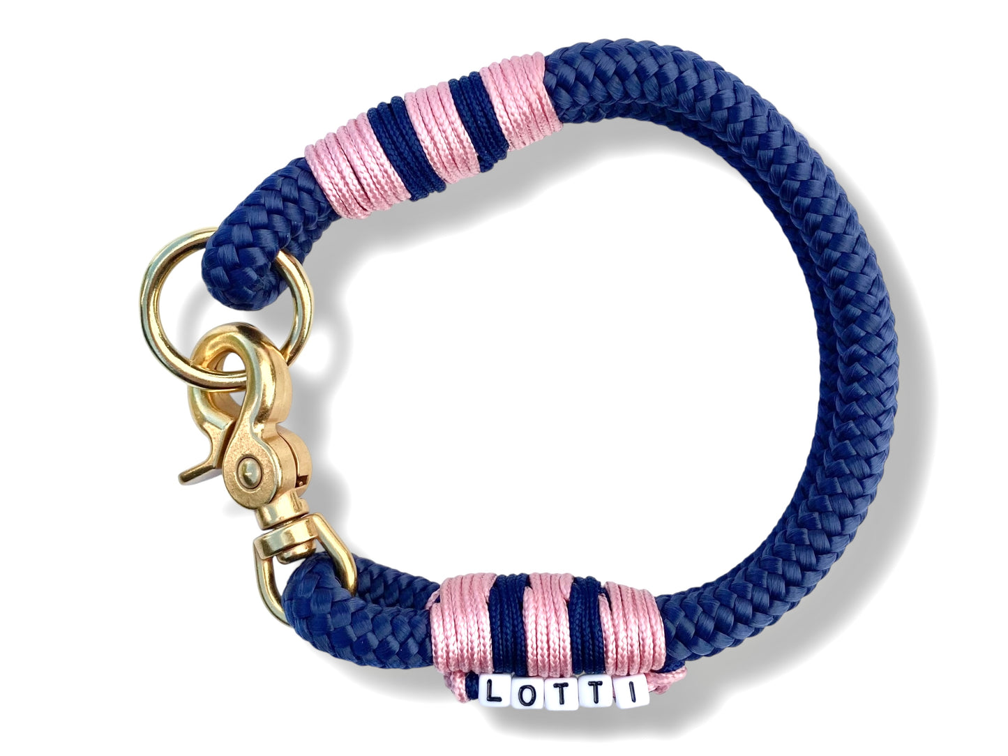 Handgefertigtes Tauhalsband in Dunkelblau und pastel rosa mit goldfarbenem Karabiner in der Draufsicht