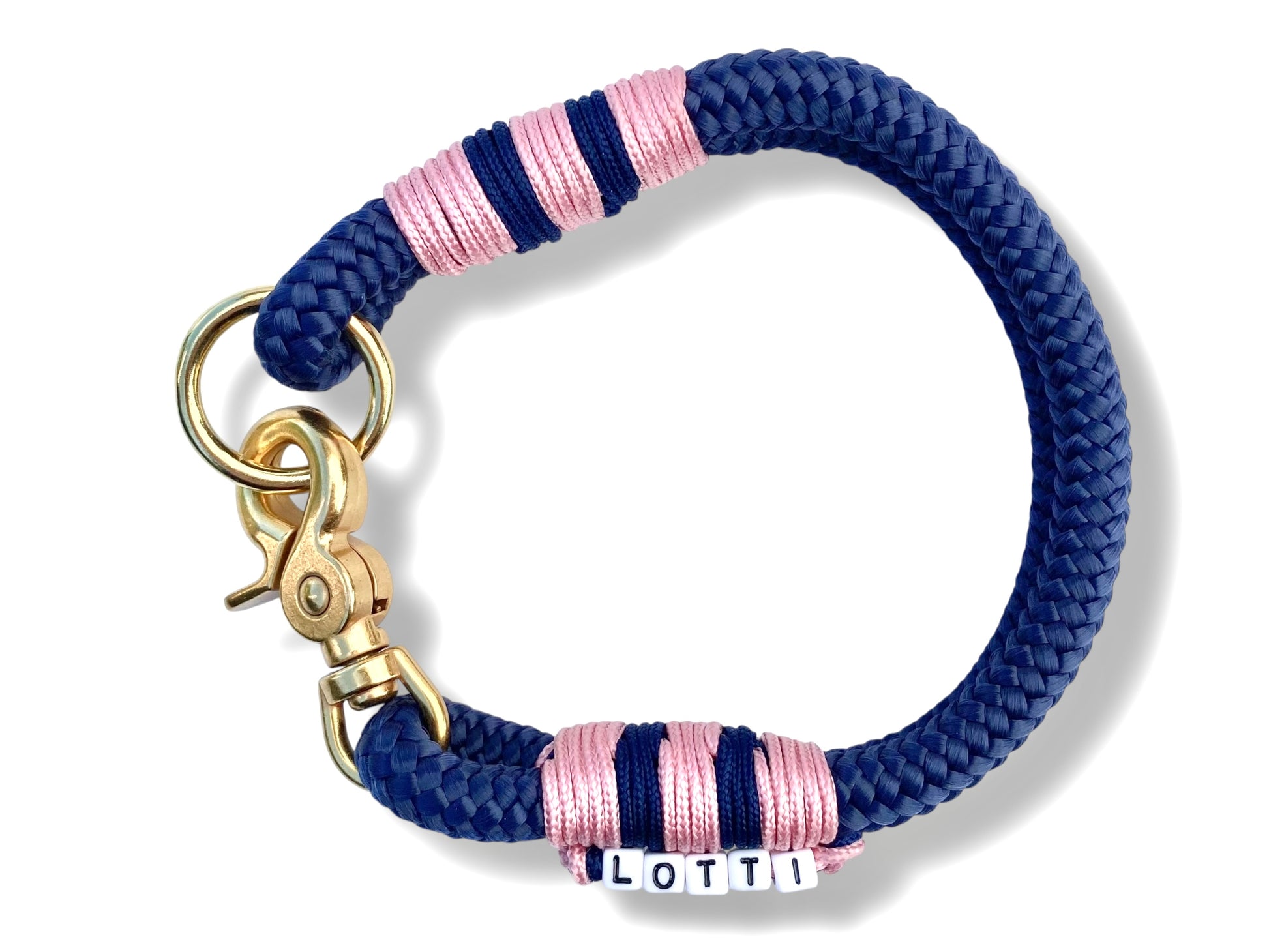 Handgefertigtes Tauhalsband in Dunkelblau und pastel rosa mit goldfarbenem Karabiner in der Draufsicht