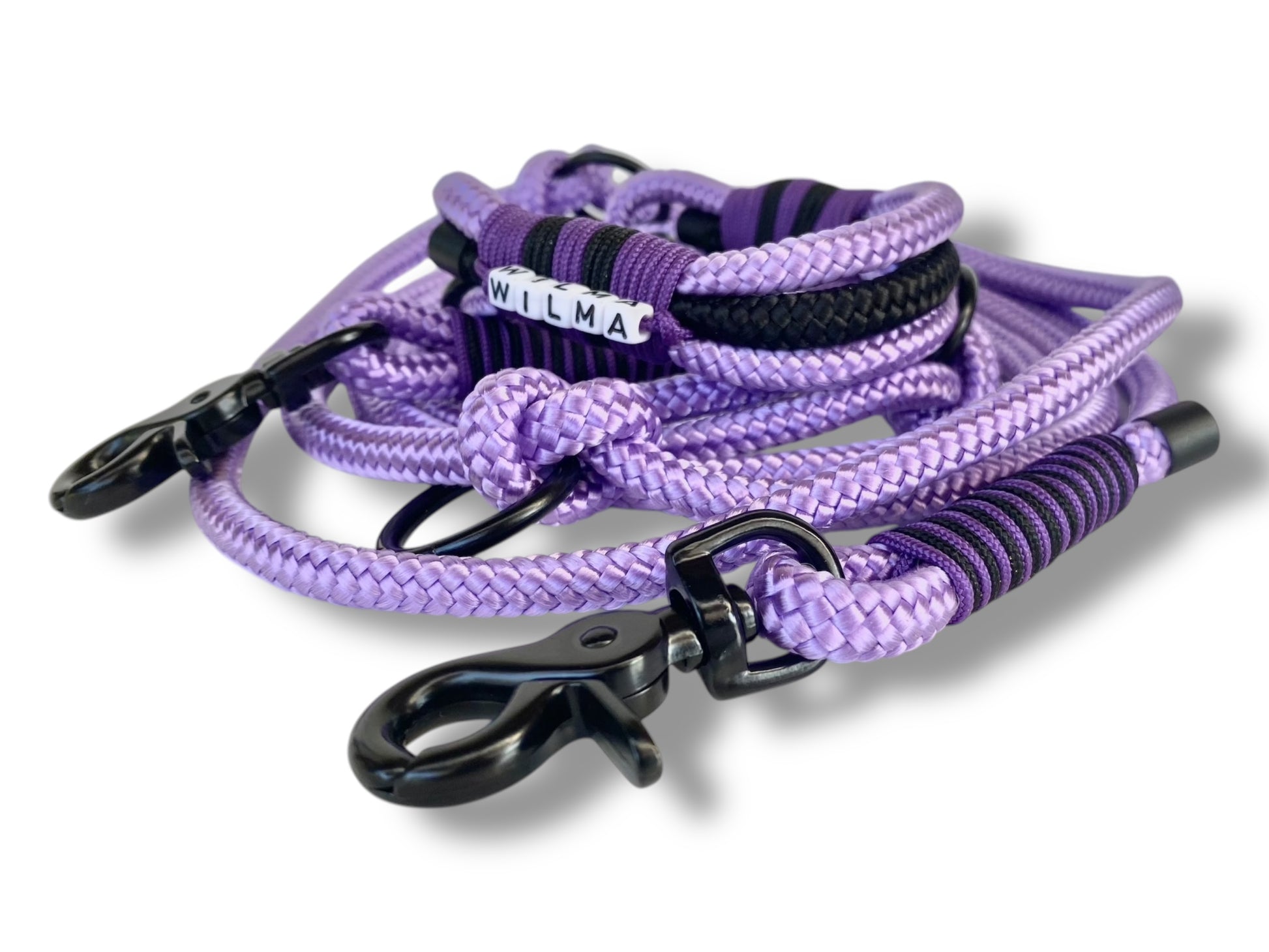 Handgefertigtes Tauset in Lila und Schwarz mit schwarzfarbenen Karabiner Gesamtansicht Seite